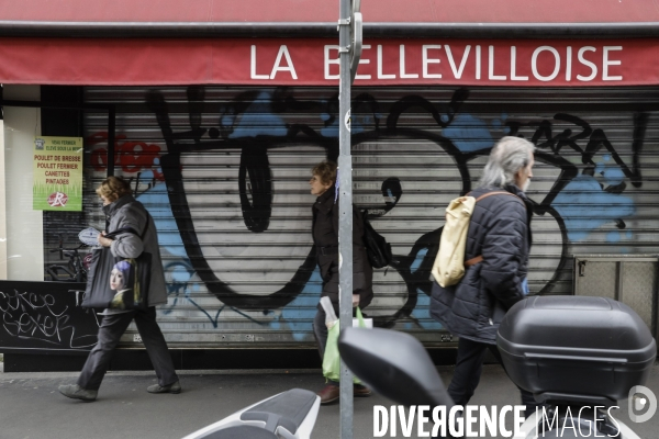 Magasins fermés la veille du premier jour de confinement rue de Belleville à Paris