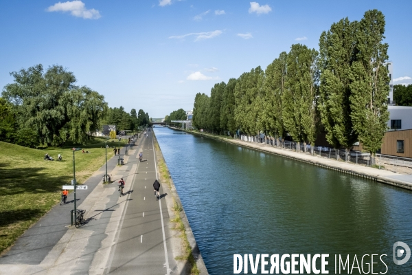 Activite sportive, urbanisation et promenade le long du canal de l Ourcq en Seine Saint Denis.