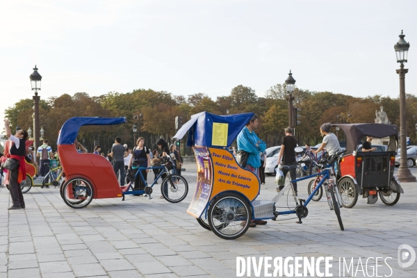 Illustration Septembre 2013.Tricycles pour le transport des touristes,place de la Concorde.