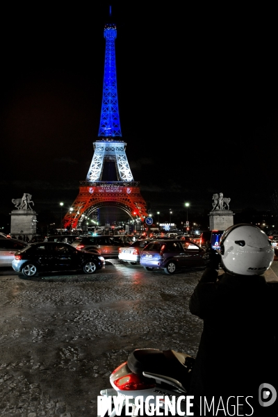 Deuil national suite aux attentats terroristes du 13 Novembre, illuminations aux couleurs tricolores de la Tour Eiffel, de l assemblee nationale,du ministere de la culture, de la tour Montparnasse