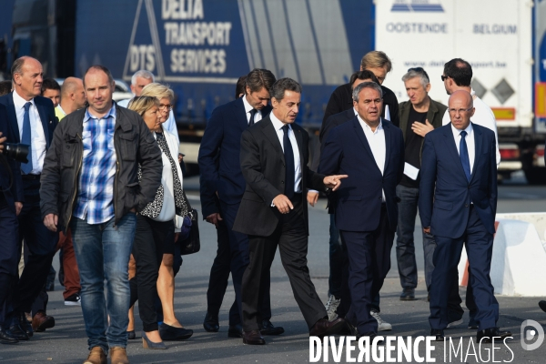 Nicolas Sarkozy au port de Calais et à une table ronde sur les migrants.