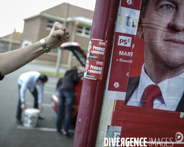 Campagne legislative de Jean-Luc Melenchon - collage d affiches