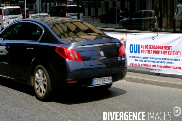 Mai2017.Banderole demandant le desangorgement routier porte de Clichy avec un acces direct au peipherique