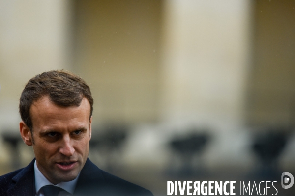 Emmanuel Macron. Prise d armes  aux Invalides