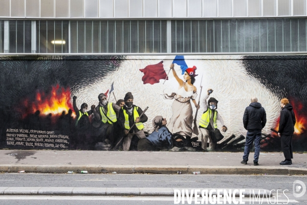 Une fresque  gilets jaunes  inspirée de Delacroix sur un mur de Paris.
