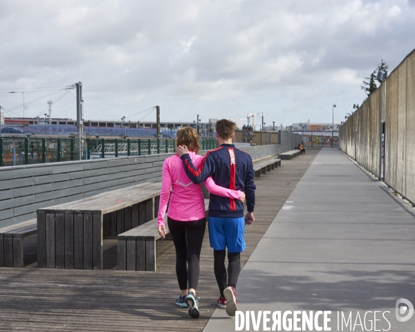 Couple de joggers, Parc ¢ol, Paris nord