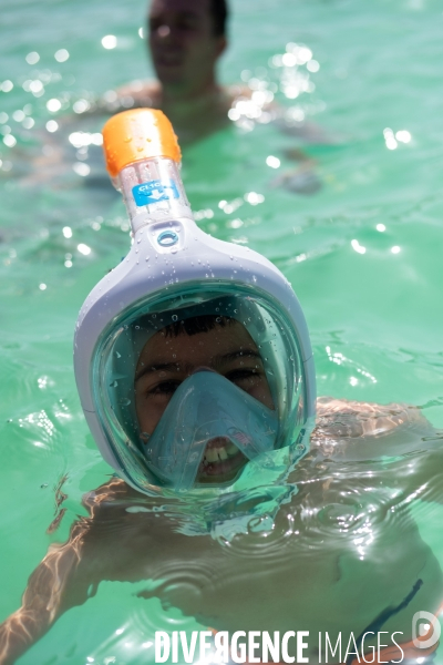 Un jour de canicule à la piscine écologique des murs à pêches de Montreuil.