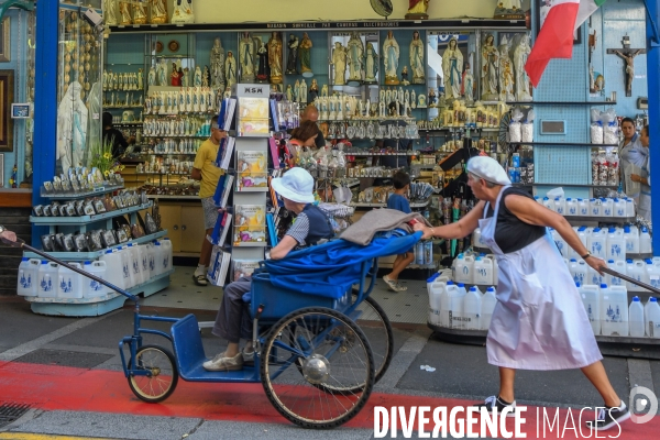 Lourdes foi et business