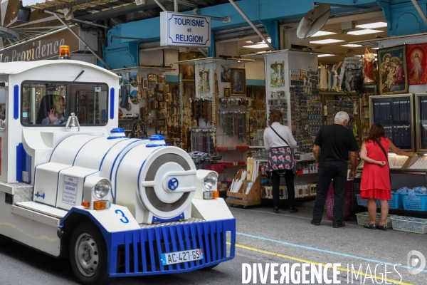 Lourdes foi et business