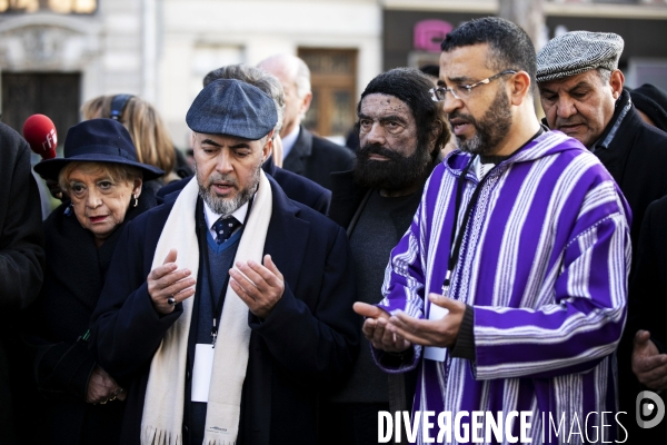 Dépôt de gerbe au Bataclan pour les imams européens.