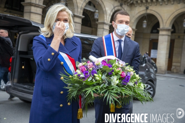 Marine Le Pen célèbre le 1er mai masquée sous la statue de Jeanne d Arc
