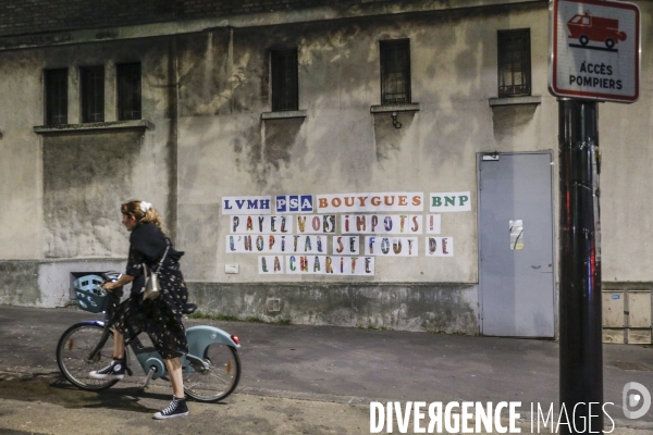 HOPITAL PUBLIC à l agonie. Affichage sauvage sur les murs de l hôpital Robert Debré et dans les rues.