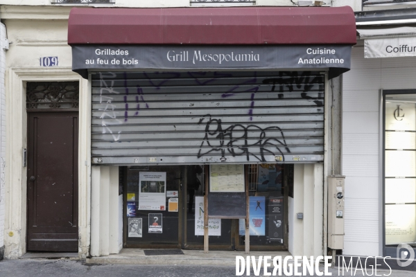 Magasins fermés la veille du premier jour de confinement rue de Belleville à Paris