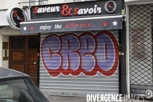 Magasins fermés la veille du premier jour de confinement rue de Belleville à Paris