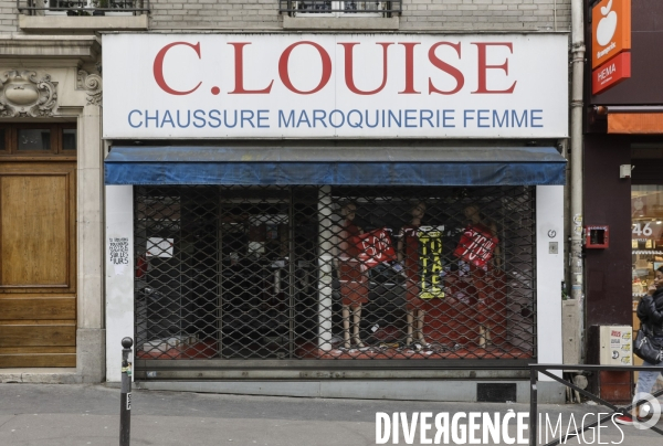 Magasins fermés la veille du premier jour de confinement rue de Belleville à Paris