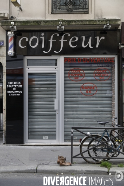 Magasins fermés la veille du premier jour de confinement rue de Belleville à Paris