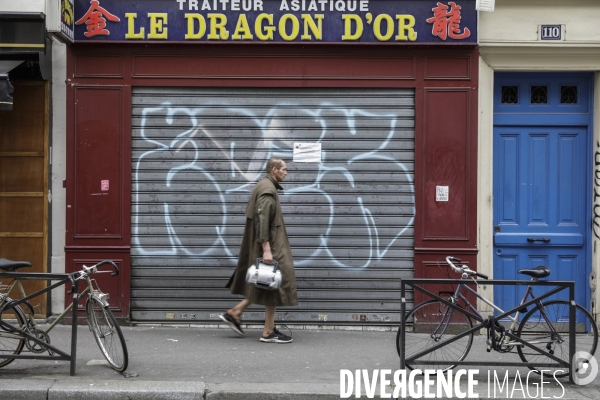 Magasins fermés la veille du premier jour de confinement rue de Belleville à Paris