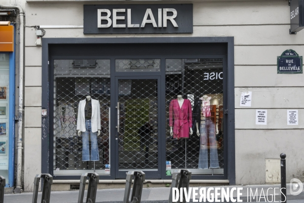 Magasins fermés la veille du premier jour de confinement rue de Belleville à Paris