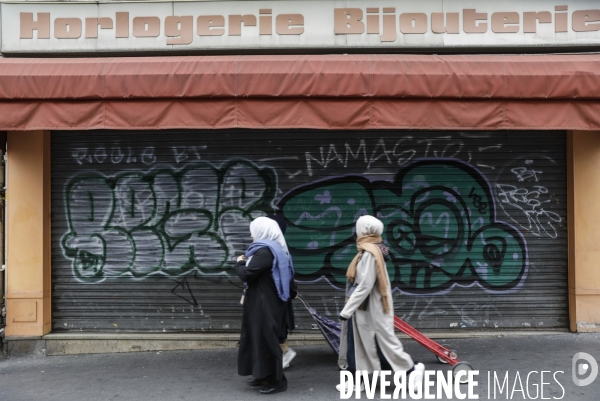 Magasins fermés la veille du premier jour de confinement rue de Belleville à Paris