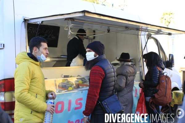 Tende le 25/11/2020 Choukri le poissonier  du Cannet sur le marché de Tende. Il n etait pas venu depuis la tempete. L ouverture de la route provisoire lui a permit de venir au village. Cela lui a pris trois heures de route, il ne devrait pas revenir avan