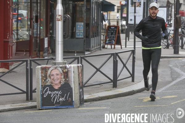 Marine le pen souhaite joyeux noel aux francais  a travers une affiche