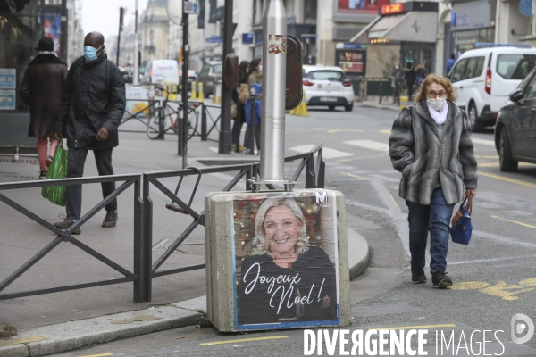 Marine le pen souhaite joyeux noel aux francais  a travers une affiche