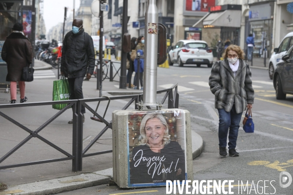 Marine le pen souhaite joyeux noel aux francais  a travers une affiche