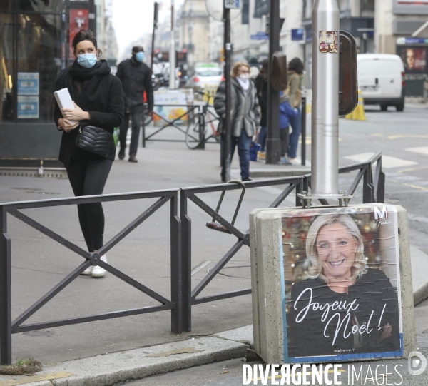 Marine le pen souhaite joyeux noel aux francais  a travers une affiche