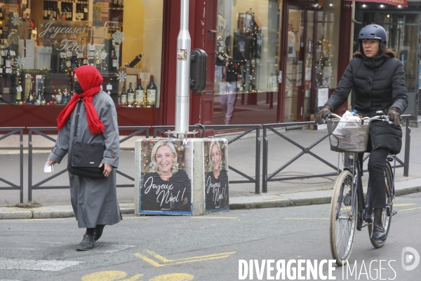 Marine le pen souhaite joyeux noel aux francais  a travers une affiche