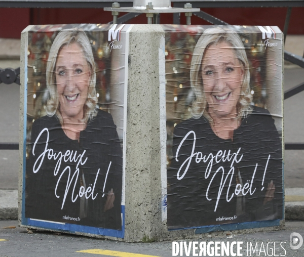 Marine le pen souhaite joyeux noel aux francais  a travers une affiche