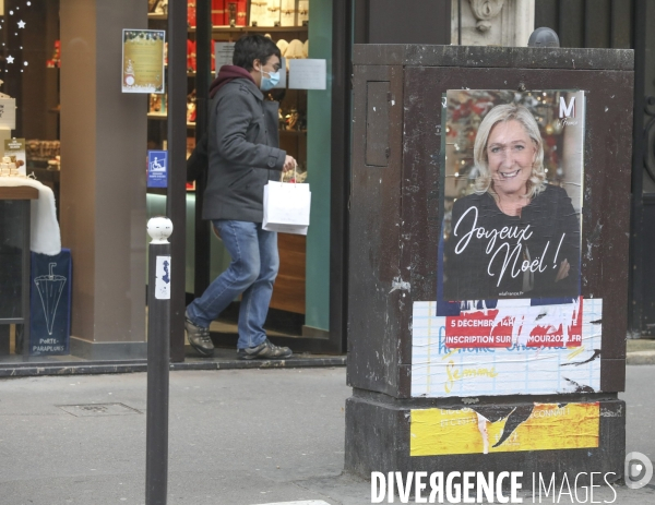 Marine le pen souhaite joyeux noel aux francais  a travers une affiche