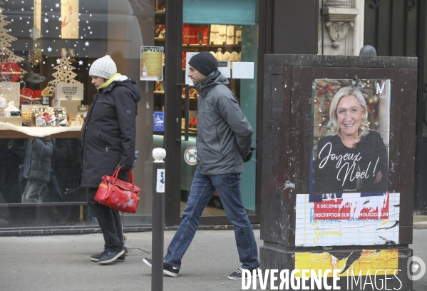 Marine le pen souhaite joyeux noel aux francais  a travers une affiche