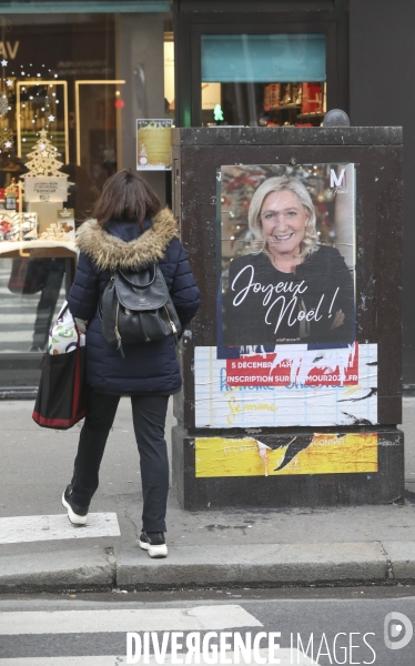 Marine le pen souhaite joyeux noel aux francais  a travers une affiche