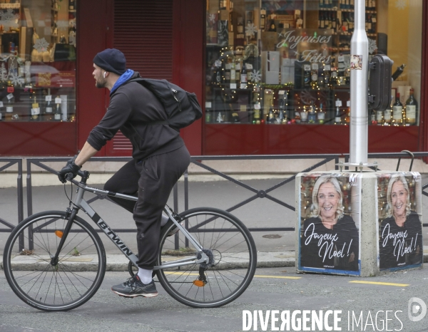 Marine le pen souhaite joyeux noel aux francais  a travers une affiche