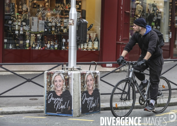 Marine le pen souhaite joyeux noel aux francais  a travers une affiche