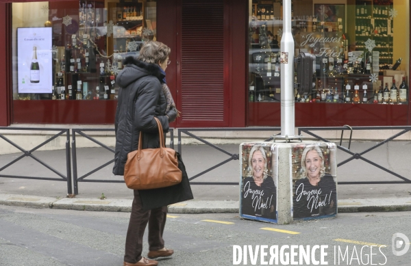 Marine le pen souhaite joyeux noel aux francais  a travers une affiche