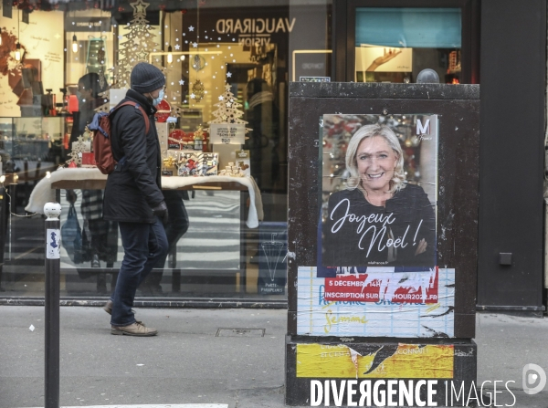 Marine le pen souhaite joyeux noel aux francais  a travers une affiche