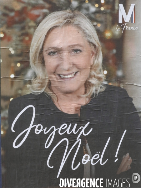 Marine le pen souhaite joyeux noel aux francais  a travers une affiche