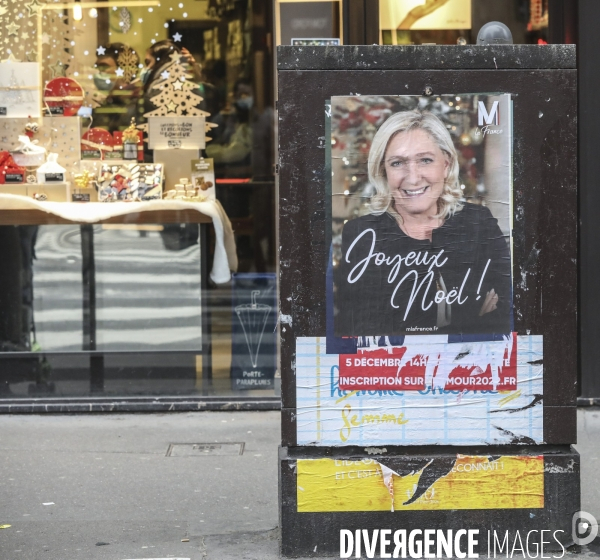 Marine le pen souhaite joyeux noel aux francais  a travers une affiche