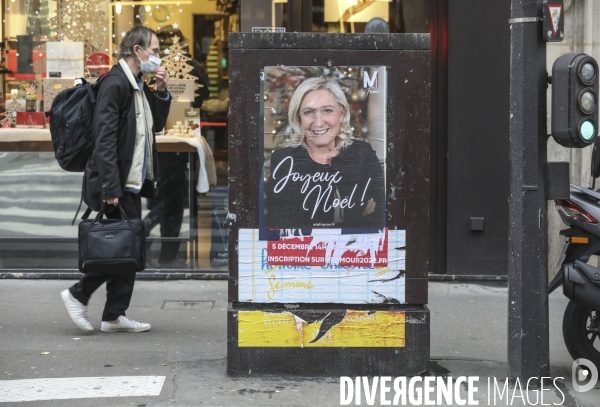 Marine le pen souhaite joyeux noel aux francais  a travers une affiche