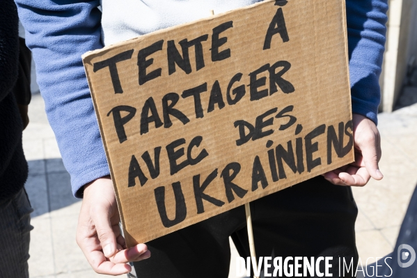 Manifestation contre la  différence de traitement  entre les exilés