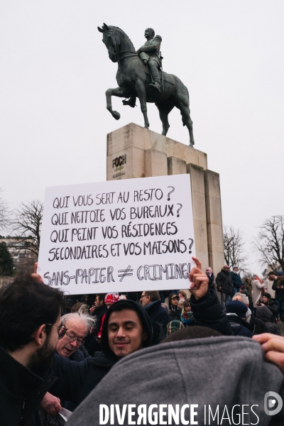 Non a la loi asile immigration.