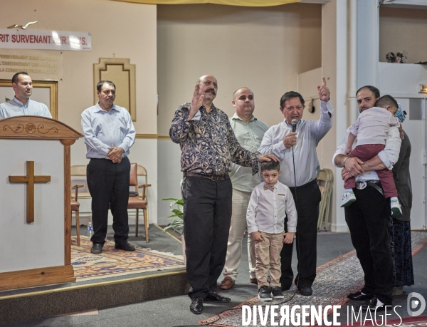 Eglise Pentecôtiste roumaine à Saint-Denis, le baptême de deux enfants roms.