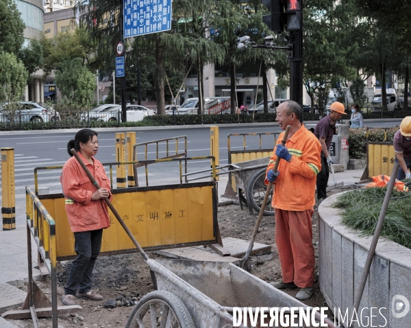 Shanghaï, réfection d’un trottoir du centre ville