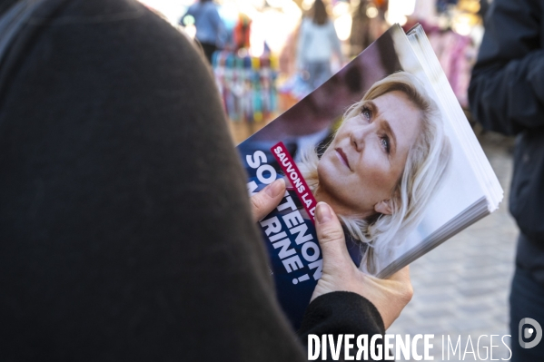Condamnation de Marine Le Pen. Militants RN et le député Julien Limongi sur le marché.