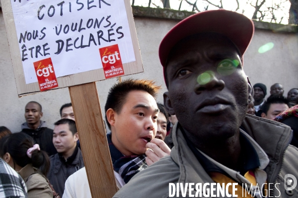 Rassemblement de travailleurs sans-papiers pour exiger leur régularisation.