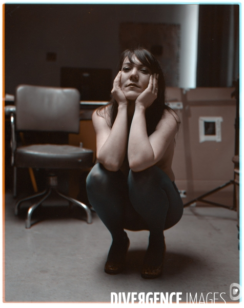 M.