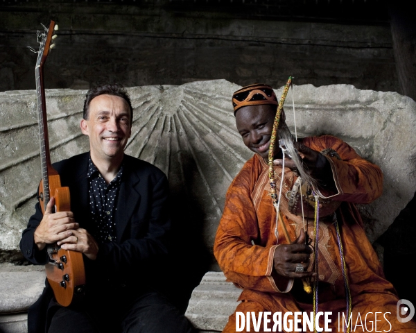 Exclusive. justin adams and juldeh camara pose in arles (france) during  les suds a arles  on july 14 2010.