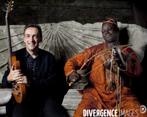 Exclusive. justin adams and juldeh camara pose in arles (france) during  les suds a arles  on july 14 2010.