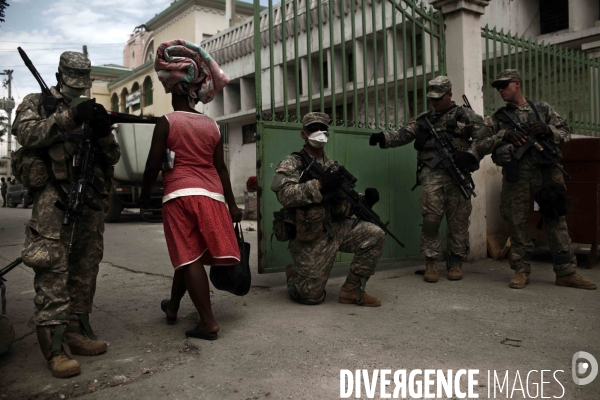 Seisme en haiti. scenes de pillages dans les rues de port-au-prince.